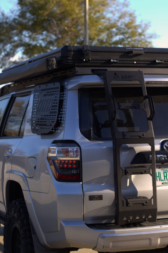 No-drill rear hatch ladder for Toyota 4Runner, providing secure roof access without modifications.