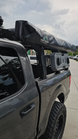 Complete Aegon bed rack kit including heavy-duty side rails, crossbars, and all necessary mounting hardware.