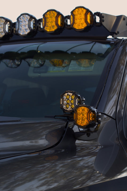 Complete kit of AEGON hood side light mounts with hardware for Toyota Tundra installs.