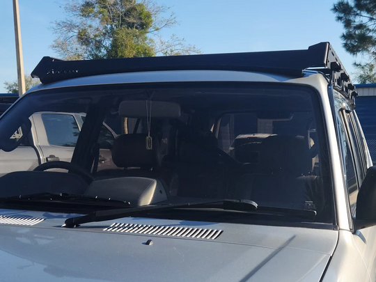 Complete Toyota Prado 90/95 rack kit including 2 side rails, 5 crossbars, and 2 wind deflectors.