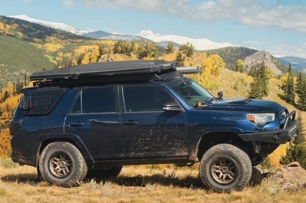 Front wind deflector on AEGON 4Runner rack for improved fuel efficiency and noise reduction.