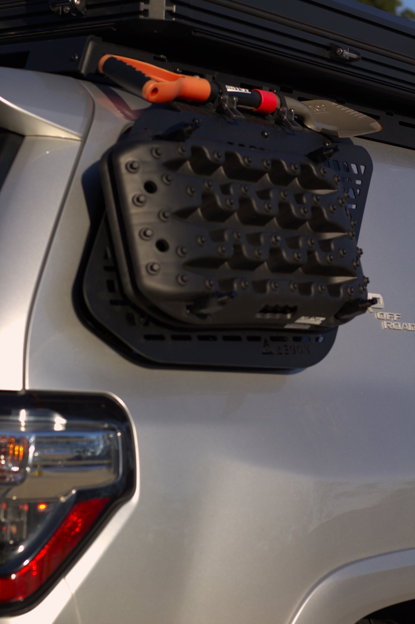 Close-up of a lightweight aluminum Molle panel with a durable black powder coat finish for corrosion resistance.