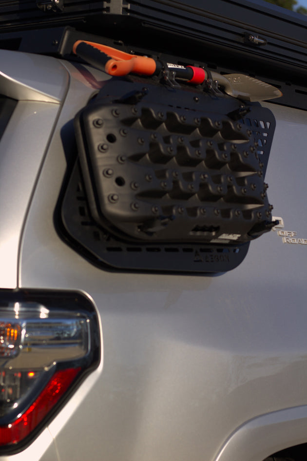 Close-up of a lightweight aluminum Molle panel with a durable black powder coat finish for corrosion resistance.