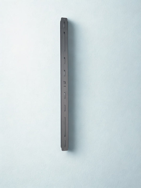 Adjustable black powder-coated crossbars with integrated T-slot for mounting awnings and lights on AEGON racks.