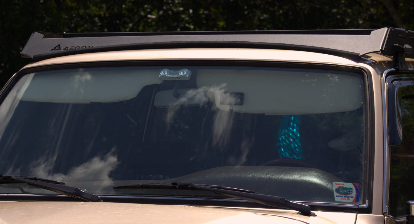 Close-up of the durable black powder coat finish on the AEGON Land Cruiser FJ60/FJ62 roof rack.