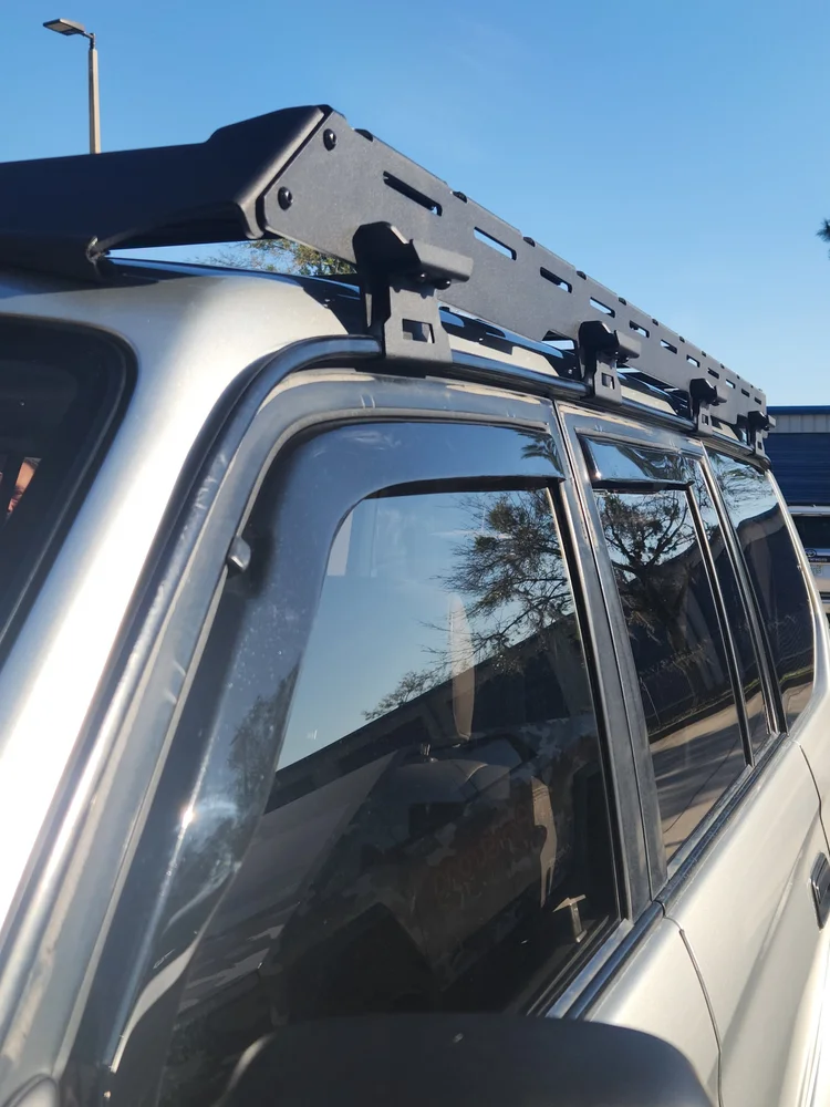 Precision CNC laser-cut aluminum roof rack for Toyota Prado 95 for perfect fitment and strength.