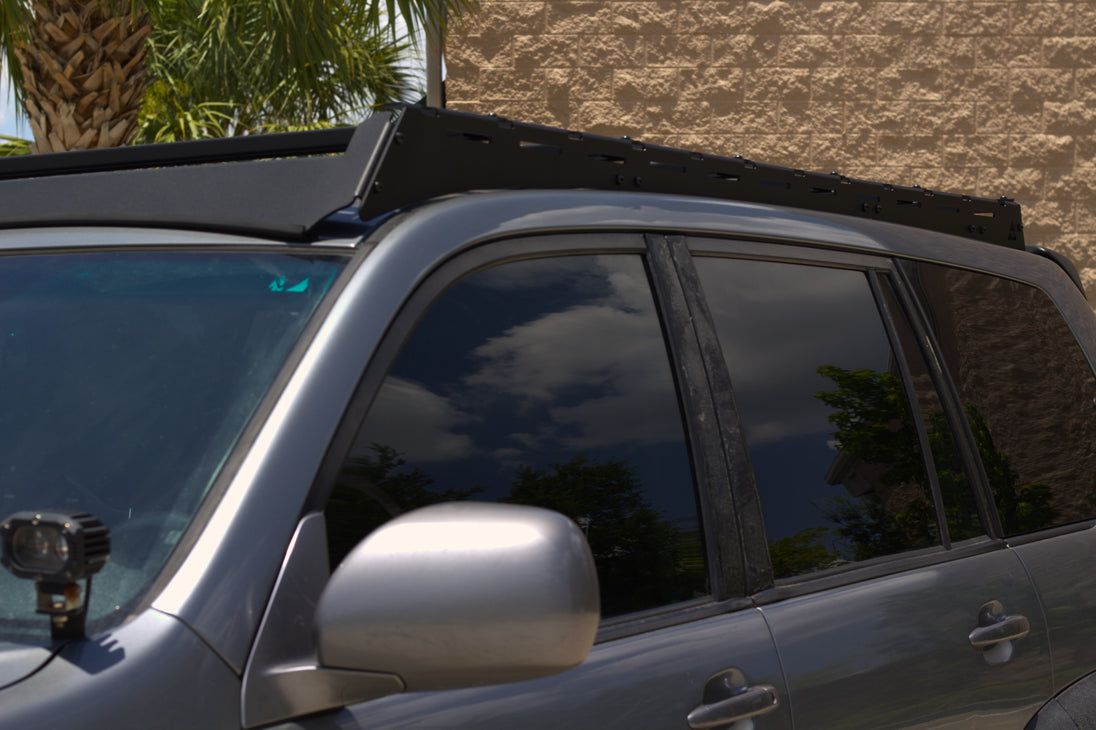 Precision CNC laser-cut aluminum roof rack made in the USA for the Lexus GX 470 platform.