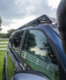 Precision CNC laser-cut steel roof rack for Toyota Sequoia featuring a sleek low-profile design and black powder coat finish.