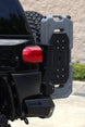 AEGON FJ Cruiser swing-out arm holding a fuel and water canister on the rear bumper