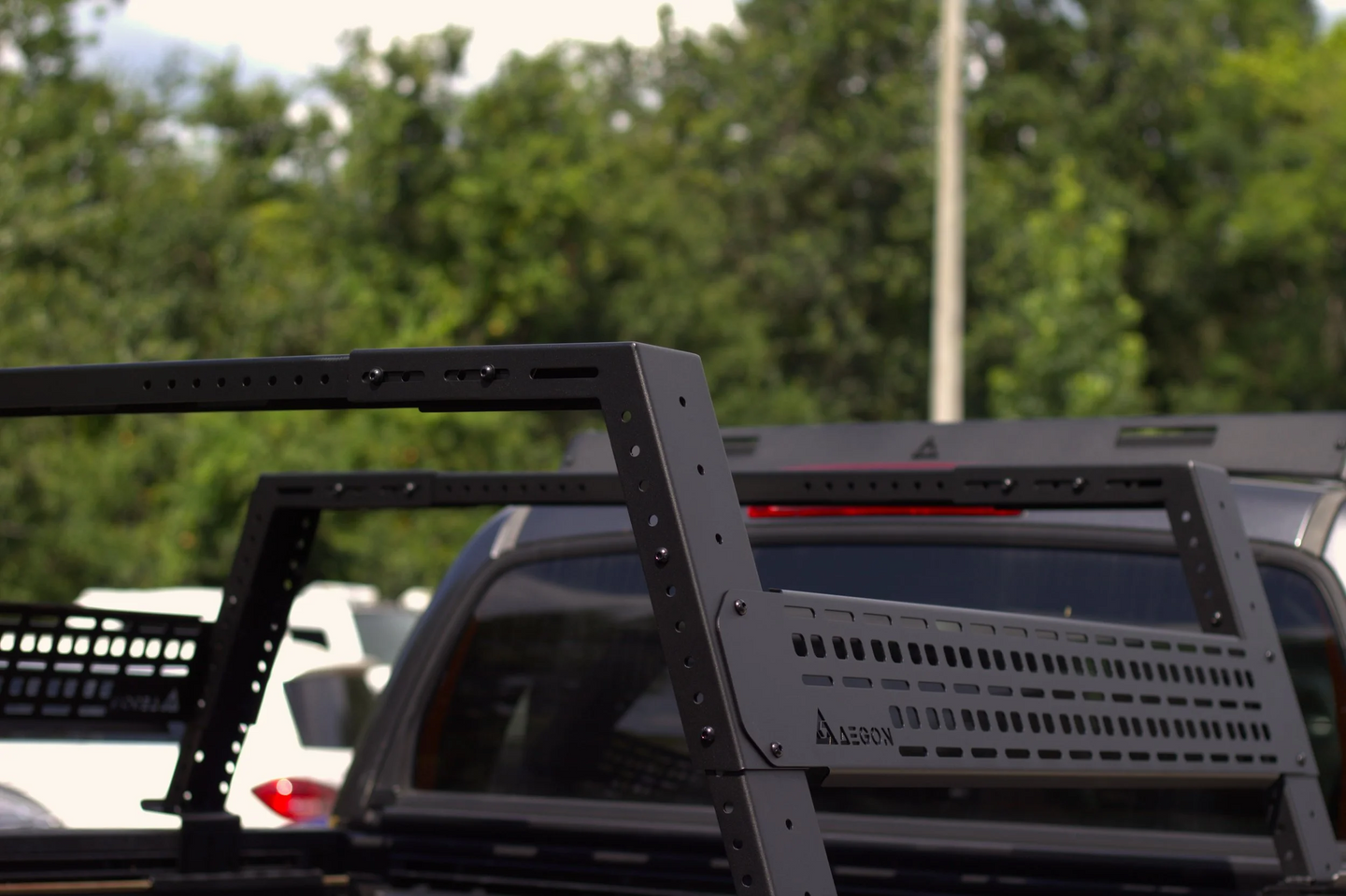 Precision laser-cut GA 12 steel bed rack with rust-resistant black powder-coated finish.