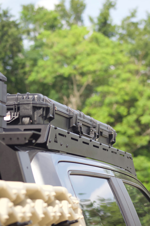 Lightweight Ford F-150 aluminum roof rack with a 900 lbs static load capacity, perfect for camping gear and rooftop tents.