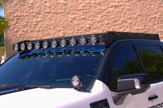 High-capacity GMC Sierra roof rack supporting 900 lbs dynamic and 1100 lbs static load for rooftop tents and heavy cargo.