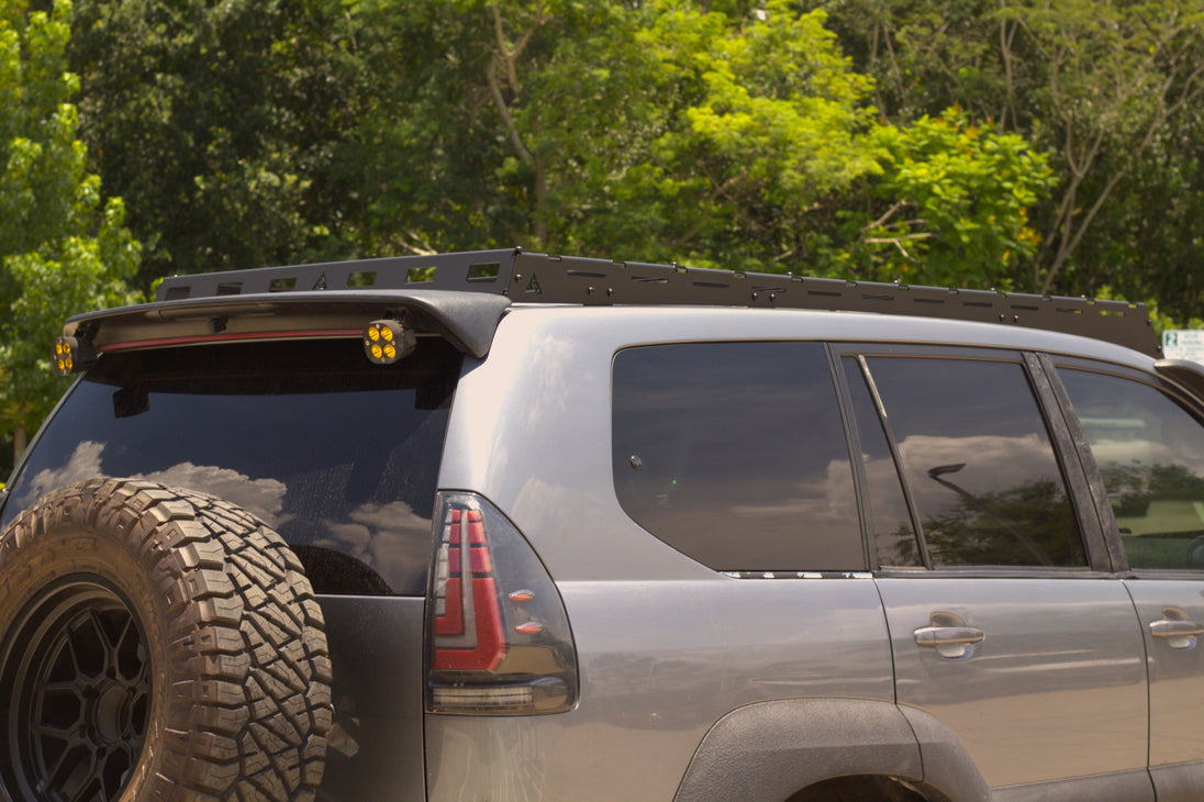 Heavy-duty aluminum roof rack for Lexus GX 470 with a 500 lbs dynamic and 900 lbs static load capacity.