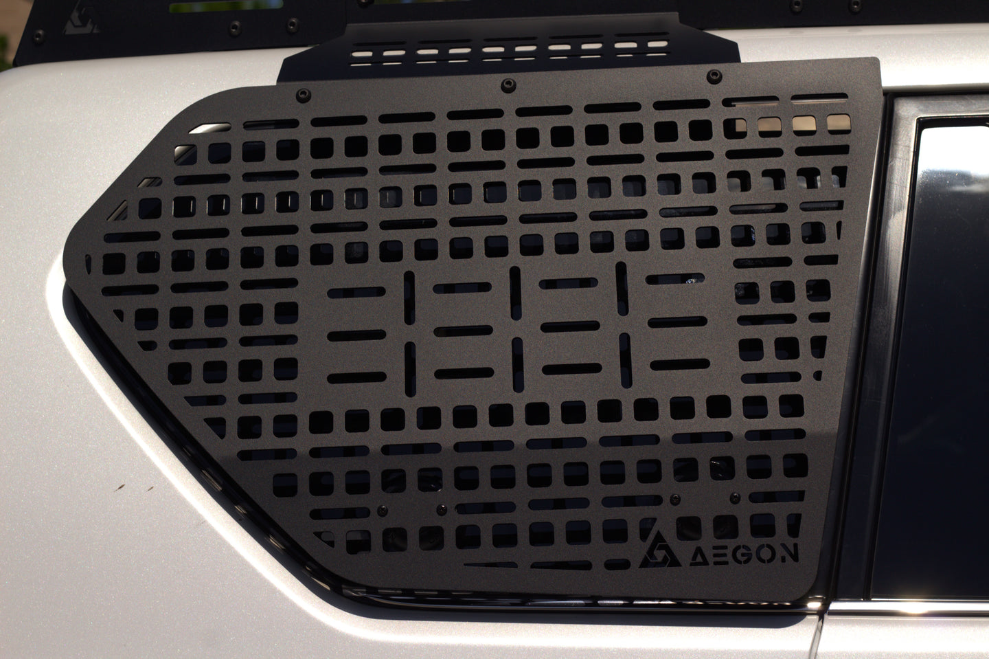 Black aluminum interior Molle panel designed specifically for the Lexus GX 460 second generation rear window area.