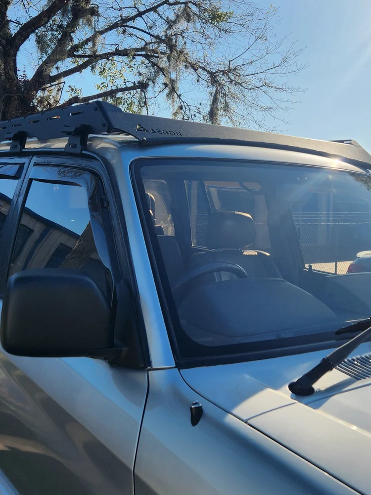 Lightweight 32 lbs aluminum roof rack for Toyota Prado 90 Series, corrosion-resistant and durable.