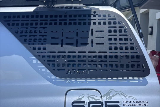 Rugged 7lb lightweight aluminum cargo panel with black powder coat finish for Toyota 4Runner interior organization.