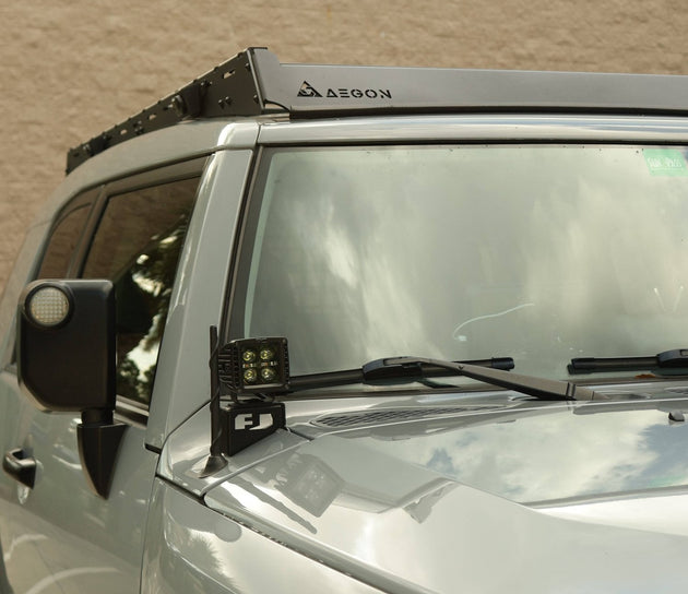 Sleek low-profile FJ Cruiser roof rack designed for reduced wind resistance and no-drill installation.