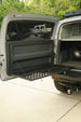 Precision-engineered tactical tailgate table made in the USA for FJ Cruiser, featuring a sleek low-profile design and included hardware.