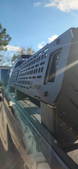 Modular truck bed rack with integrated accessory slots for mounting Rotopax, recovery boards, and shovels.