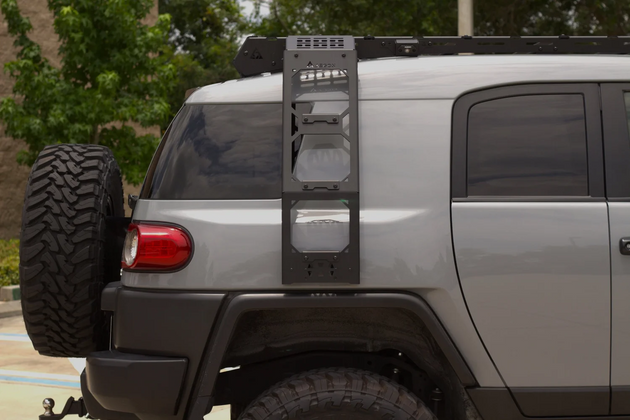 Bolt-on FJ Cruiser side ladder designed for easy installation without drilling or permanent vehicle modifications.