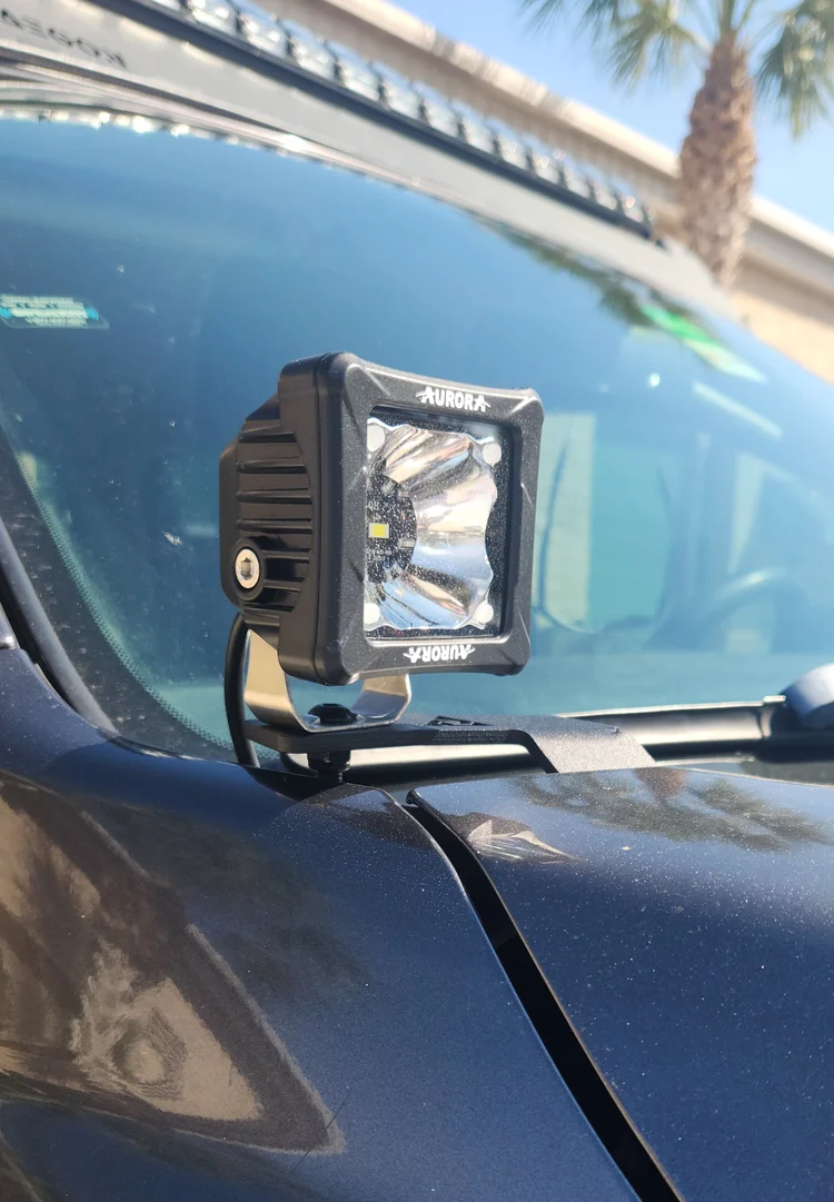 No-drill hood ditch light mounts for Toyota Tundra featuring a corrosion-resistant powder-coated finish.