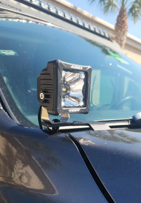 No-drill hood ditch light mounts for Toyota Tundra featuring a corrosion-resistant powder-coated finish.