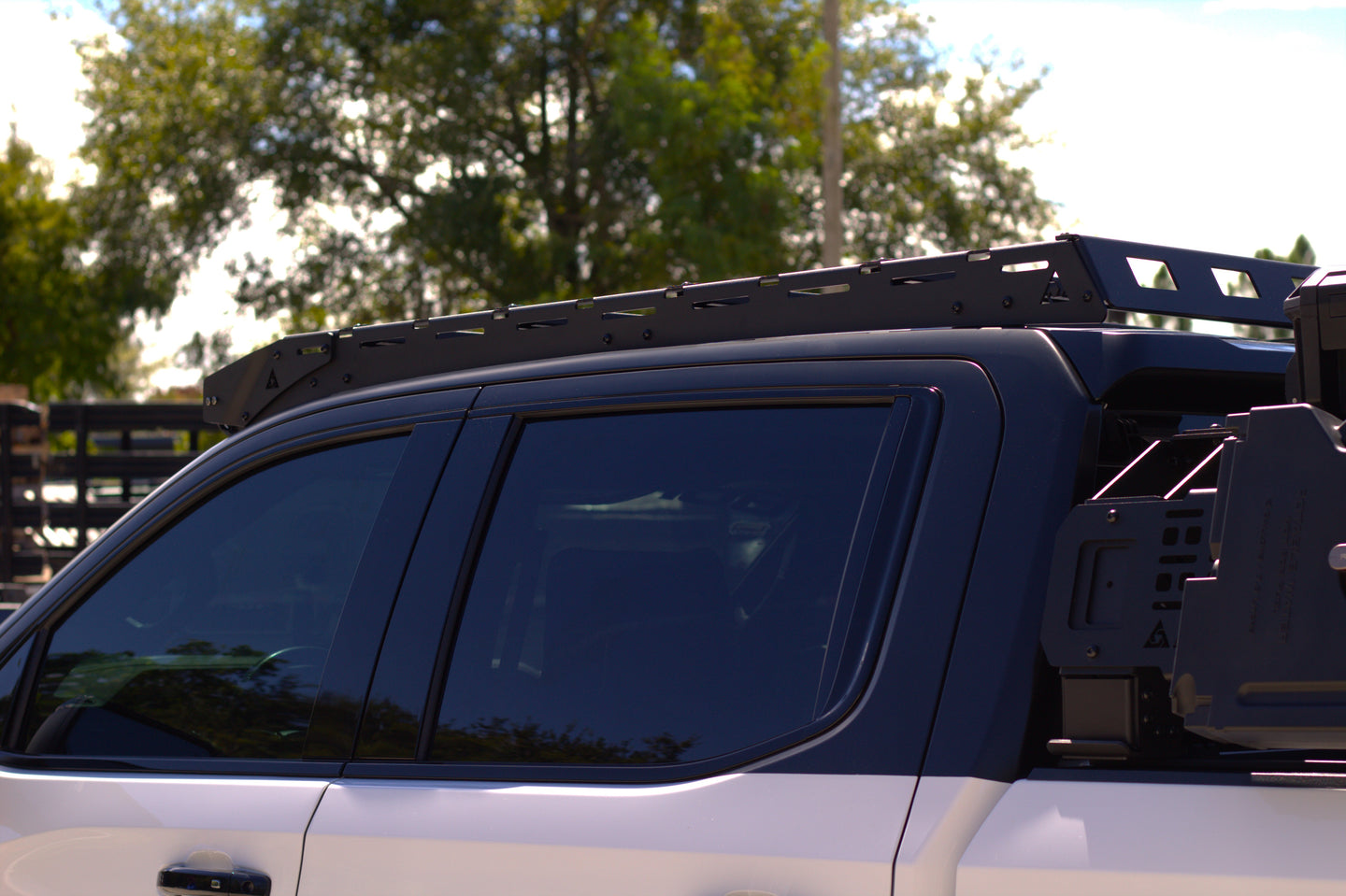 Easy no-drill installation roof rack system for GMC Sierra 1500 including all assembly hardware and side rails.