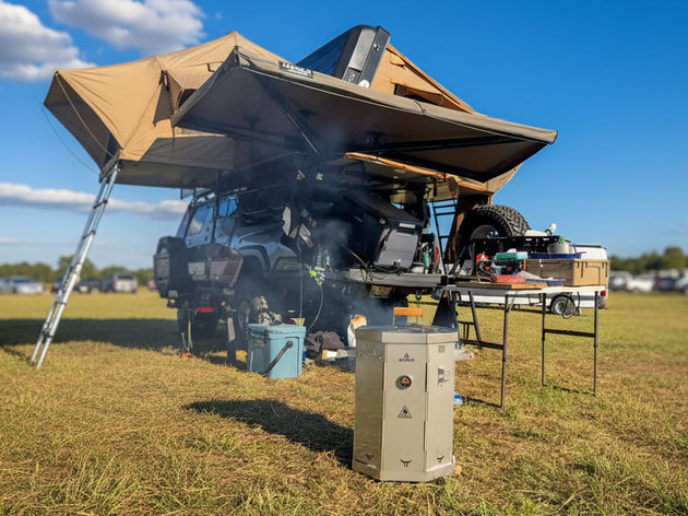 Portable and collapsible stainless steel smoker barrel that packs down for easy transport in the included waterproof bag.