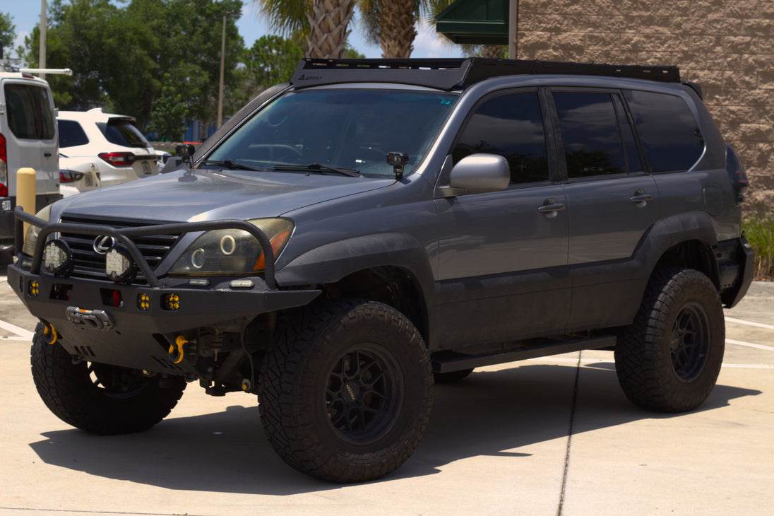 Premium black powder-coated overland roof rack for Lexus GX 470, ideal for mounting rooftop tents and camping gear.