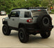 Premium aluminum overland roof rack for hauling camping equipment and heavy gear on a Toyota FJ Cruiser.