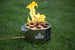 Compact propane fire pit used for tailgating and backyard outdoor living spaces.