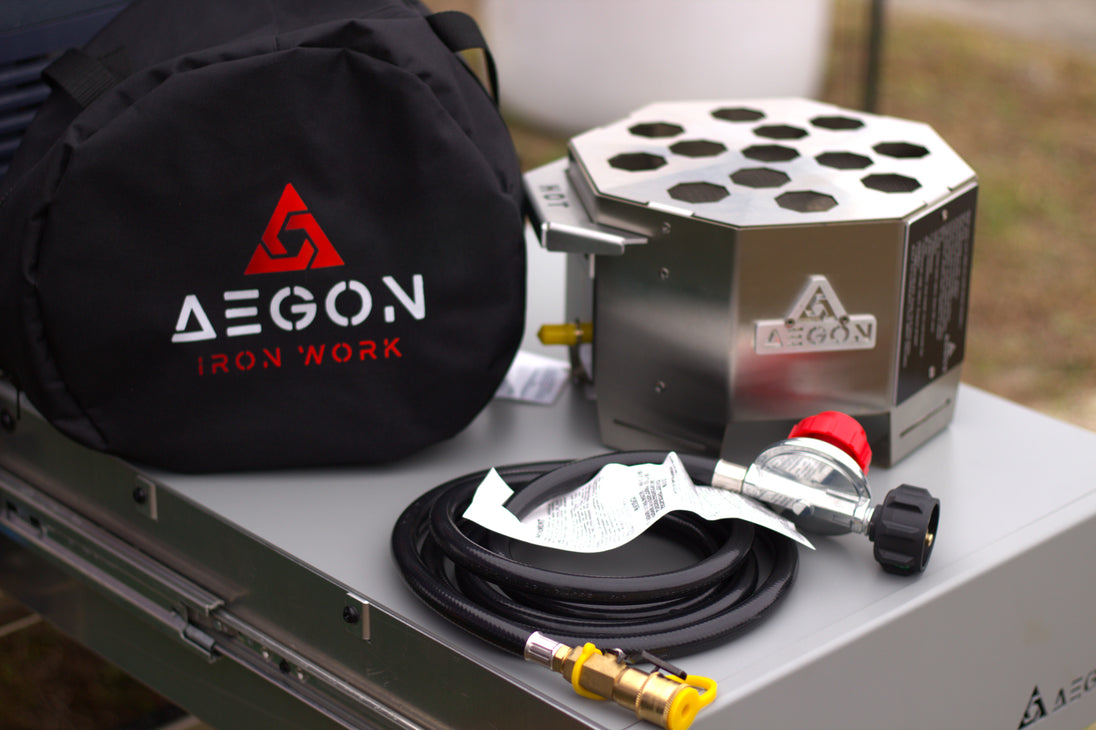 Front view of a portable stainless steel propane fire pit designed for outdoor camping.