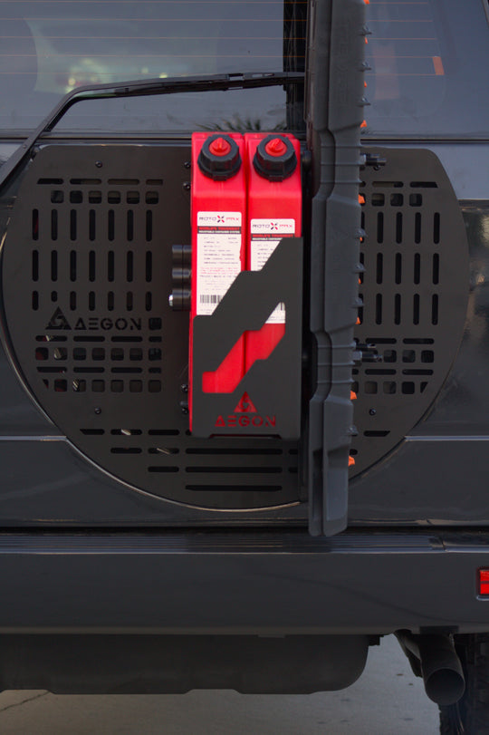 Close-up of Aegon Ironwork Molle Panel showing RotopaX fuel canister and traction board mounting points for Prado 90.