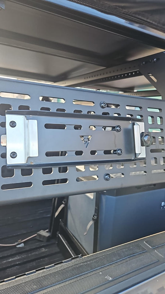 Heavy-duty aluminum and stainless steel MOLLE mount bracket for propane campfires.