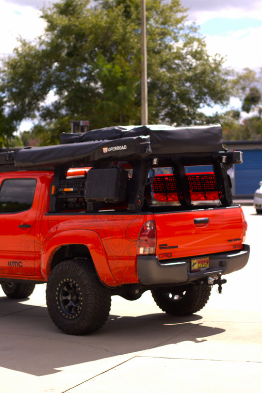 Sleek rear profile of the AEGON aluminum rack showing clean lines and modular design.