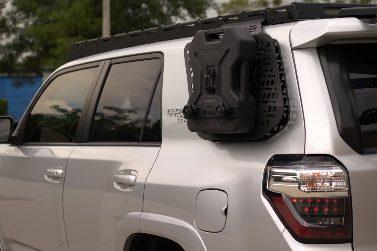 Black aluminum Molle panel for 5th Gen Toyota 4Runner models 2010 to 2024 rear window storage.