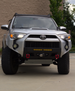 Heavy-duty 3/16 inch steel front bumper for Toyota 4Runner 5th Gen (2010-2024), winch-ready with integrated recovery points.