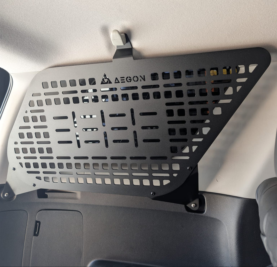 Toyota 4Runner interior Molle storage panels made of lightweight aluminum for trunk cargo organization.