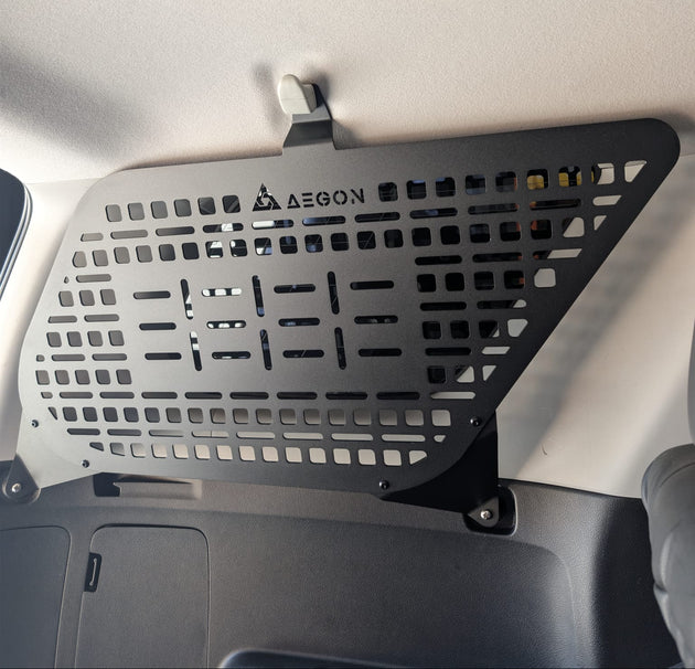 Toyota 4Runner interior Molle storage panels made of lightweight aluminum for trunk cargo organization.