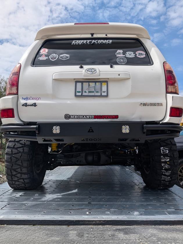 Rear view of a 4th Gen Toyota 4Runner with a black high-clearance steel bumper.