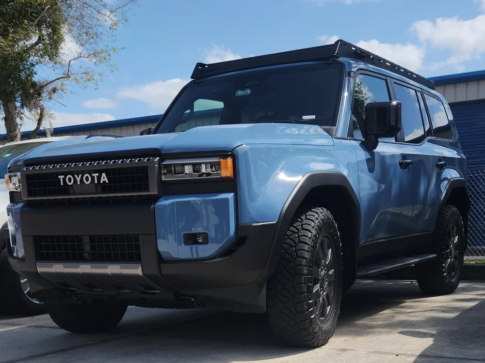 Full-length aluminum roof rack for the new Toyota Land Cruiser 250 Series (2024-2025) with black powder coat finish