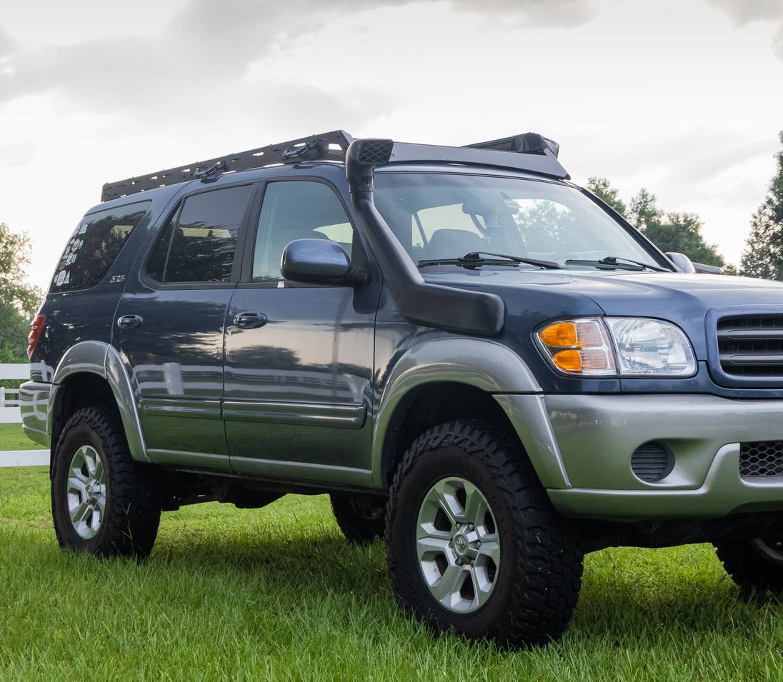 Full-length heavy-duty steel roof rack custom-fit for 1st Generation Toyota Sequoia models from 2001 to 2007.