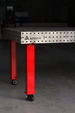 Heavy duty welding workstation with 4 inch leveling casters supporting up to 4400 lbs load.